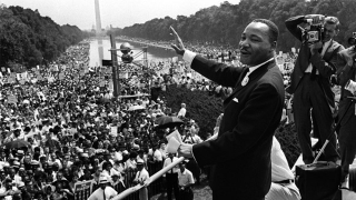 Illustration for article titled 16 Pictures Of Martin Luther King Jr. Sprinting Through Times Square